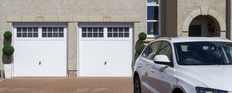 Steel up and over garage doors