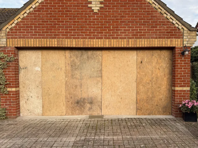Boarded Up Garage Opening
