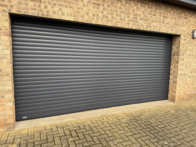 SeceuroGlide Original roller door in an anthracite foil finish, installed in Aldeburgh.