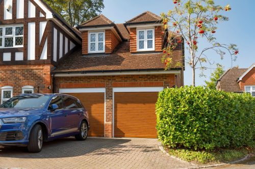 Pair of Golden Oak Roller Doors